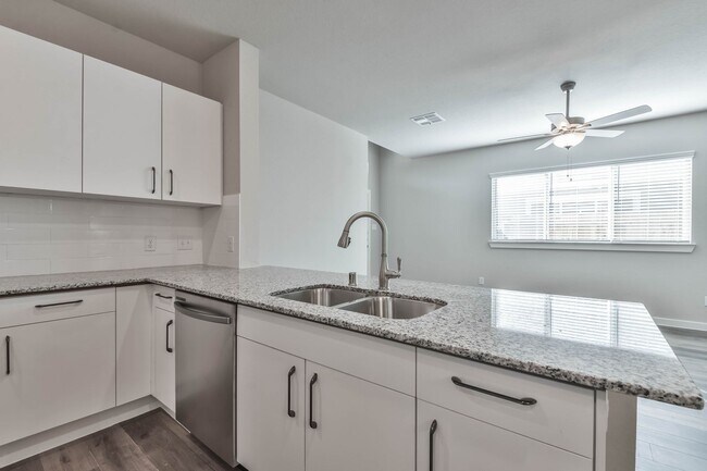 Building Photo - High Ceilings, Low Maintenance -Say Hello ...