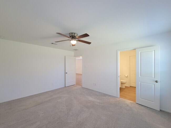 Building Photo - This single-story home has a comfortable layout with three bedrooms and a living area all on one ...