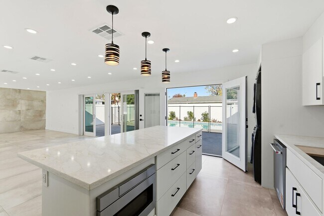 Building Photo - Newly Rebuilt Luxury 3 Bed Home with Pool, Designer Kitchen, Huge Courtyard, Near Topanga Mall