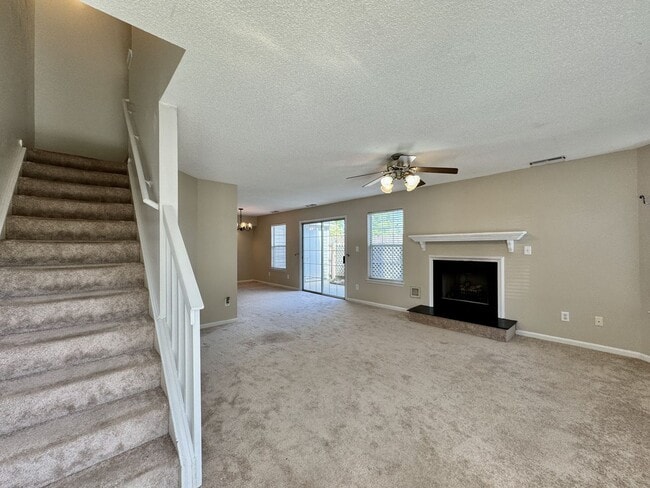 Building Photo - Available 06-15-25! End-Unit Condo w/2 Pri...