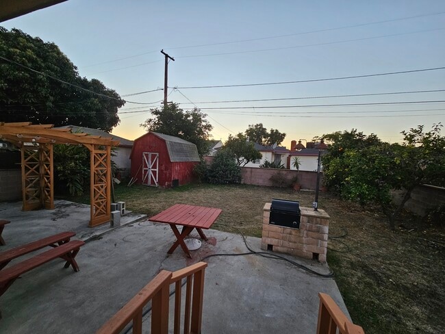 BBQ and Red Barn in the backyard. - 22909 Broadwell Ave