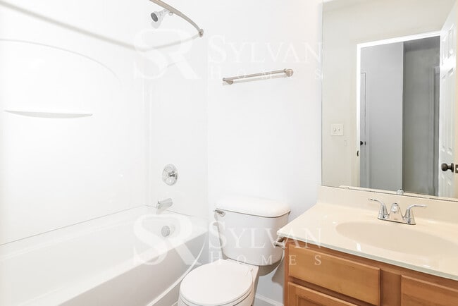 Building Photo - This adorable home is ready for your personal touch!