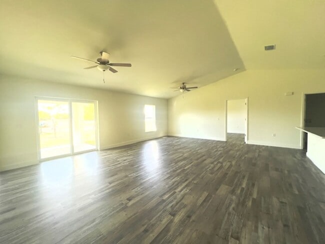 Building Photo - Available Now!! NW CAPE CORAL - 4 Bedrooms - 3 Bathrooms - 2 Car Garage