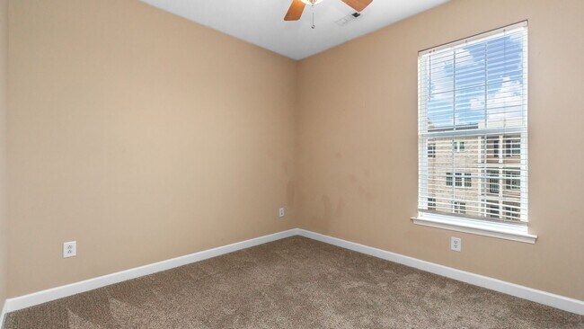 Building Photo - Located just Steps from Shopping, Dining, & Entertainment in The Market Common