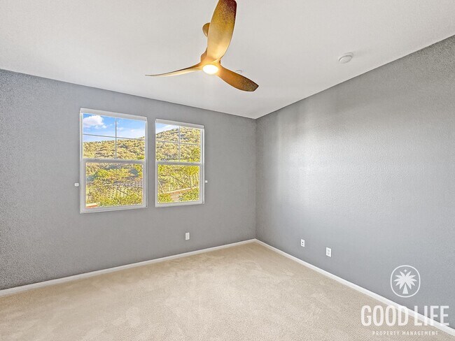 Building Photo - Elegant 3BR Residence in Exclusive Gated Community w/ AC & Garage!