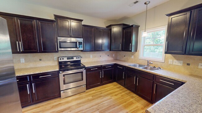 Building Photo - Updated 3 Bedroom, 2.5 Bathroom 2-Story w/...