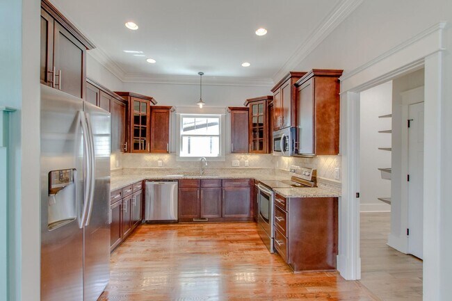 Building Photo - Stunning 4 Bedroom / Amazing Location / Fenced in Backyard / Beautiful Covered Front Porch