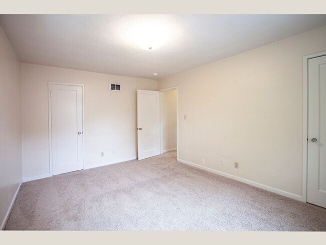 Building Photo - Stylish Mid-Century Retreat, Park Like Set...