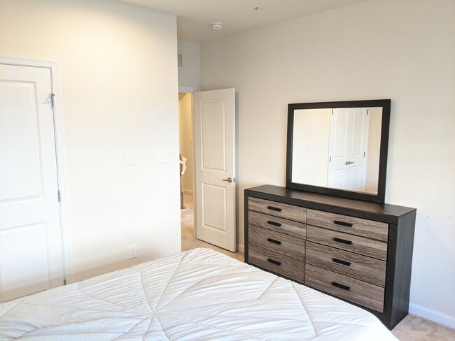 Building Photo - Bottom level (two story) *END UNIT* condo ...