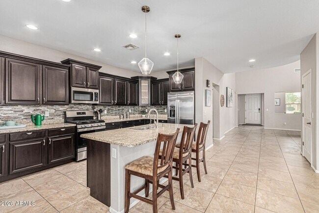 Building Photo - 7657 S Debra Dr