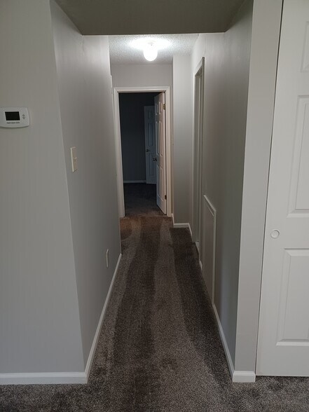 Hallway leading to bedrooms and hall bathroom - 2208 Clark Ct