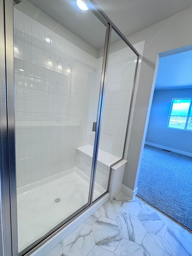 Building Photo - Sage Meadows II Townhomes — Lakeside Living Meets Modern Comfort!