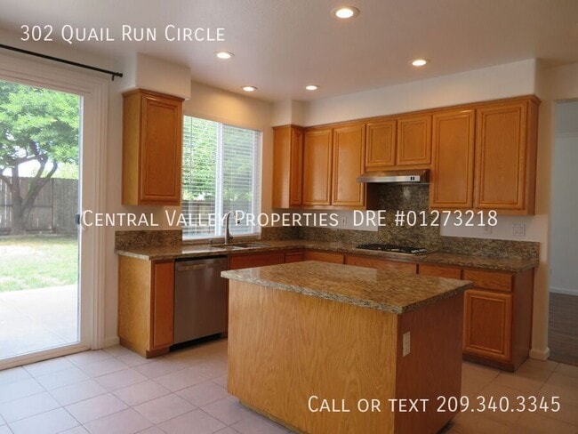 Building Photo - 302 Quail Run Cir