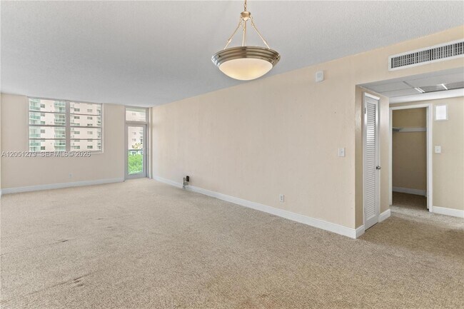 Building Photo - 19390 Collins Ave