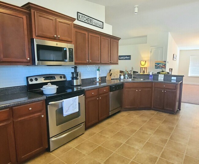 Building Photo - Corner Lot 4/2 Home - Fenced Yard - Near NAS