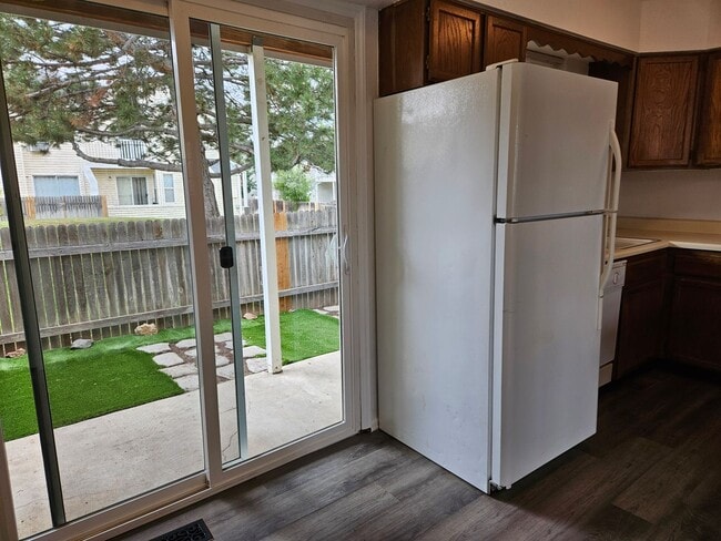 Building Photo - Adorable Loft Style One Bedroom Condo Steps from Buckley AFB