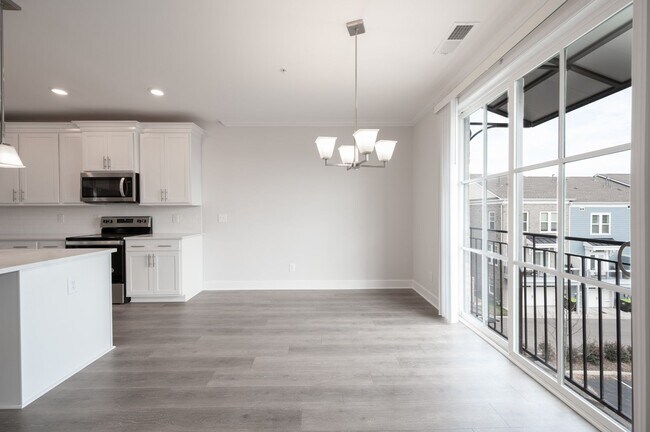 Building Photo - 2022-BUILT BURKITT COMMONS CONDO WALKABLE ...