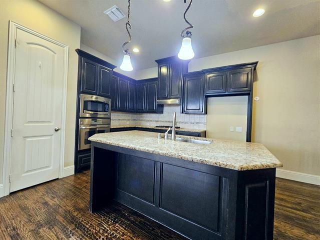 Building Photo - 7047 Comal Dr