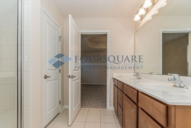 Building Photo - Spacious 3-Bed End Unit Townhome with 2-Car Garage & Private Patio | Prime Kitts Creek Location