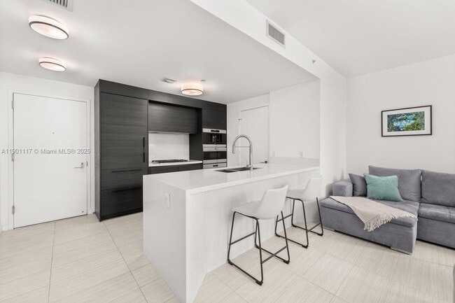Building Photo - 1 Collins Ave
