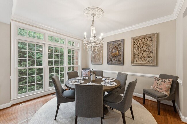 Building Photo - Discover this stunning four-level townhous...