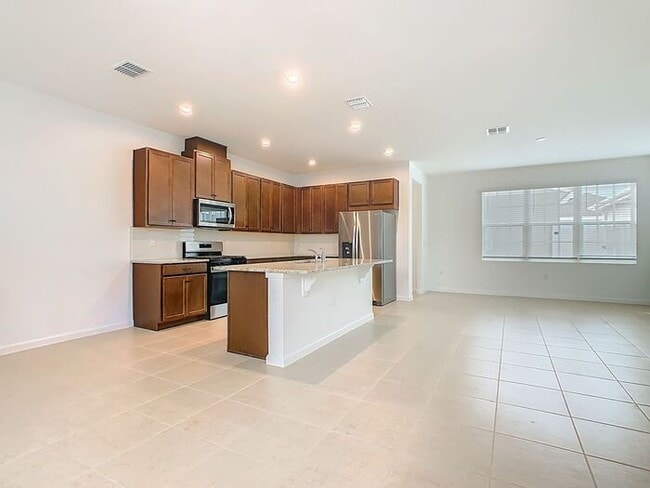 Building Photo - New Luxury Townhome in Celebration, FL Corner unit. All porcelain tiled floors. Aleutian model by...
