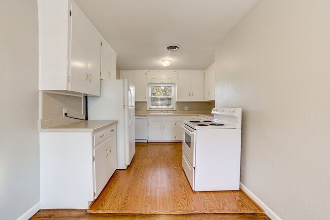 Building Photo - Welcome home to this charming 1955 ranch, thoughtfully suited for modern living.