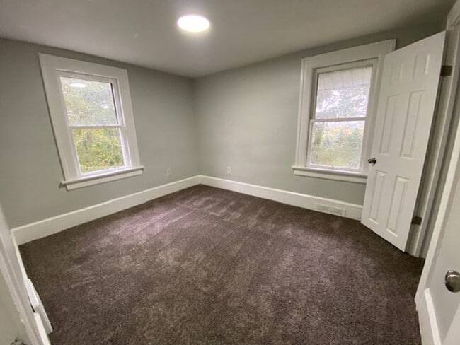 Building Photo - Updated 5-Bed, 2-Bath with Attic Suite & C...