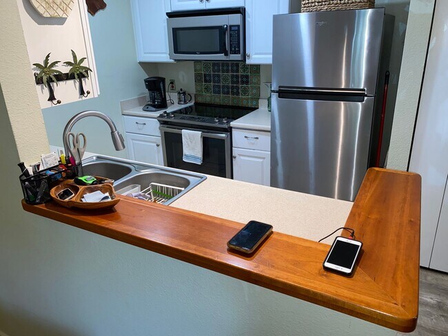 Building Photo - Nicely Furnished, tastefully remodeled, downstairs Kihei Villages with 2 designated parking spaces