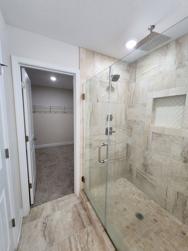 Building Photo - Welcome to this stunning 4-bedroom, 3-bath...