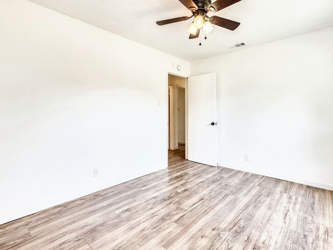 Building Photo - Charming 4BR / 2BA Home Featuring Fireplace, White Cabinets & Big Tree