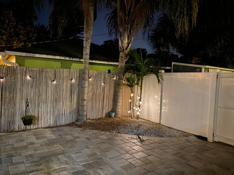 Private patio at night - 3425 16th St N