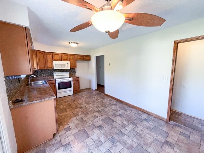 Building Photo - Stylishly Renovated 4-Bedroom Ranch with F...