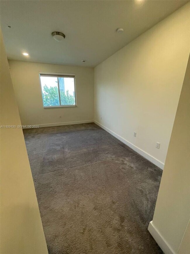 Building Photo - 6416 NW 102nd Ct