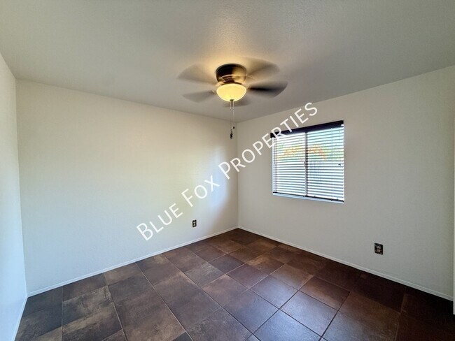 Building Photo - 7650 N Rasmussen Ave