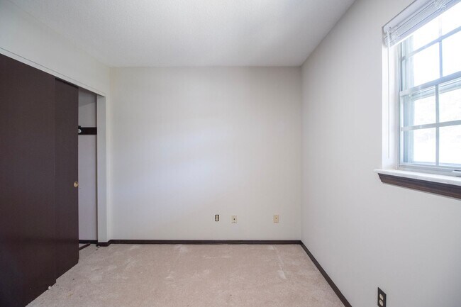 Building Photo - Charming 3BR Home-Screened Porch, Private Garage & Massive Backyard