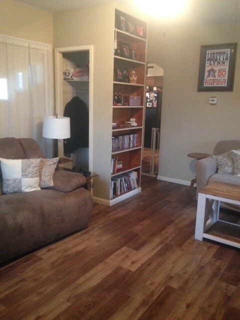 Living room with built in bookcase and coat closet. - 2913 S Rogers St