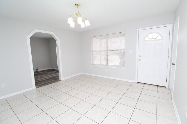 Building Photo - Charming 3-Bedroom Brick Home on Half an A...