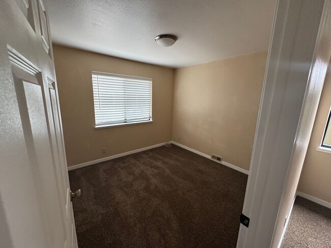 Building Photo - Welcome to your newly remodeled townhome!