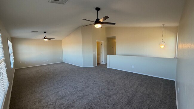 Building Photo - Spacious Surprise home with large backyard