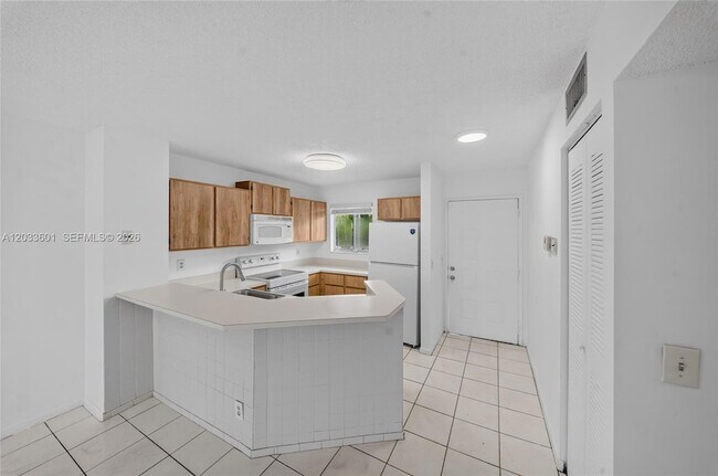 Building Photo - 8750 N Sherman Cir