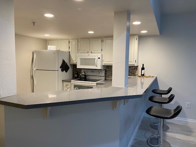 Fully stocked kitchen - 215 Stone Pine Ln