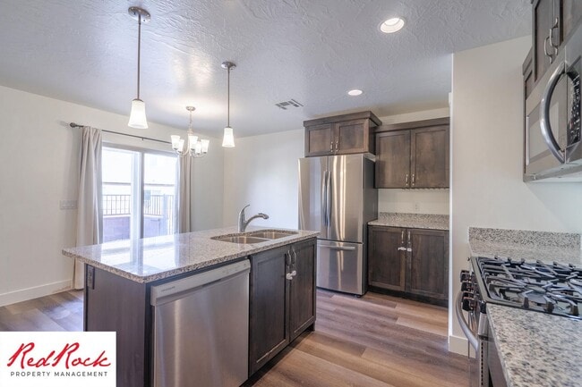 Building Photo - Move In Special - $500 Off First Months Rent! Stunning 4 Bedroom Townhome!