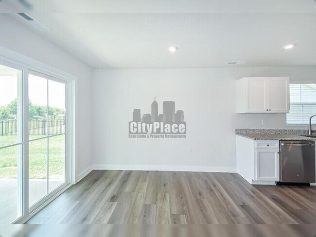 Building Photo - 7009 E Bean Blossom Dr