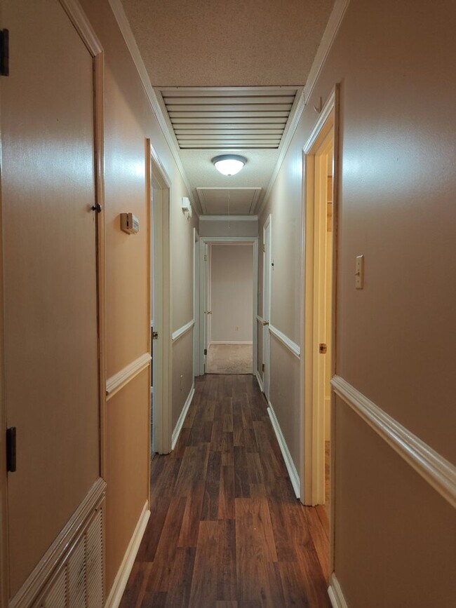 Building Photo - Elegant & Spacious 3-Bedroom Brick Home with Private Garage