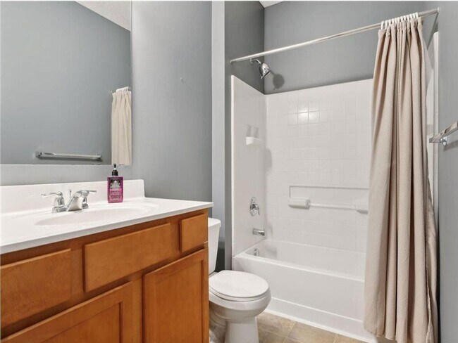 Building Photo - Upscale Townhome with Large Office-Loft, 3 Baths, 2-Car Attached Garage, Quartz Countertops and M...