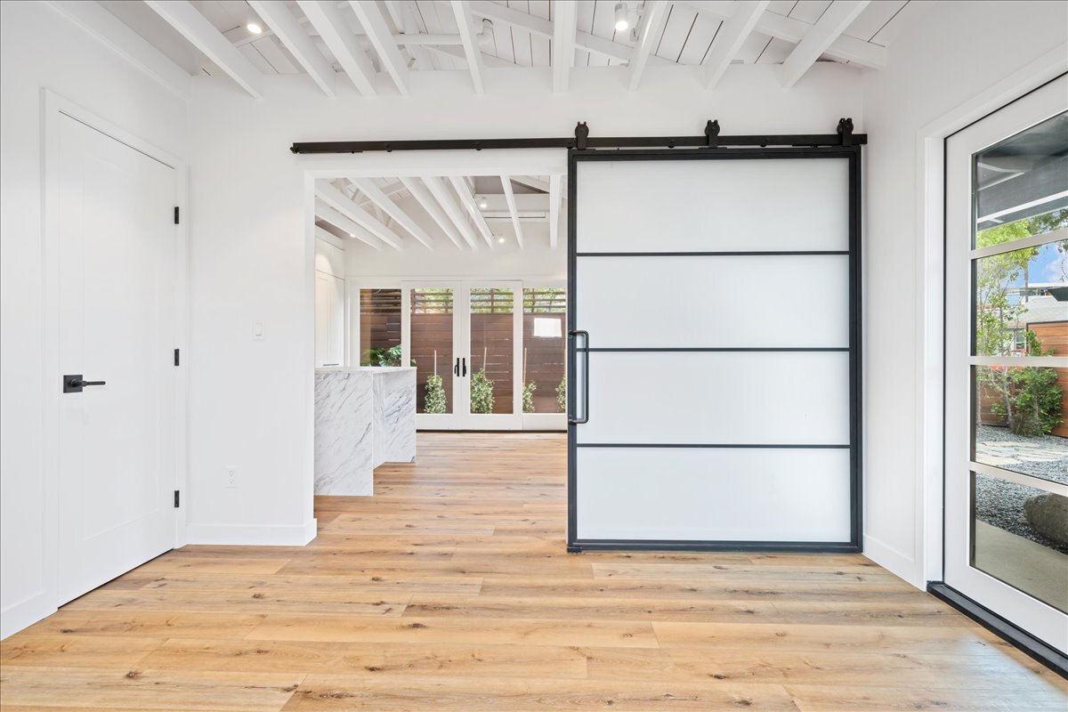 Bedroom with barn door open - 4027 Moore St