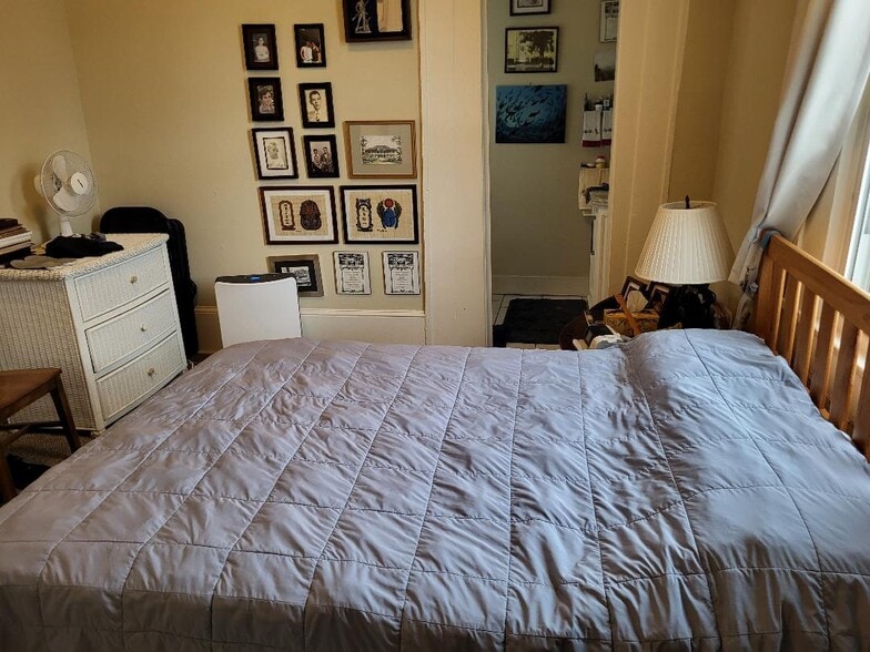 bedroom with bathroom door - 2530 Jena St