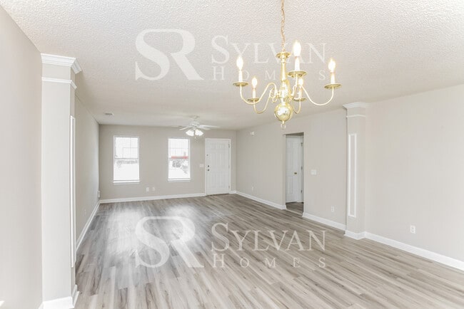 Building Photo - Welcome to this beautiful and sun-filled 3...