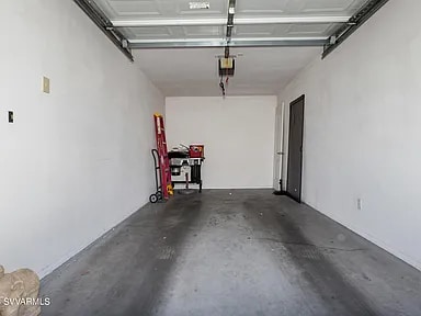 One-car garage parking - 985 E Mingus Ave